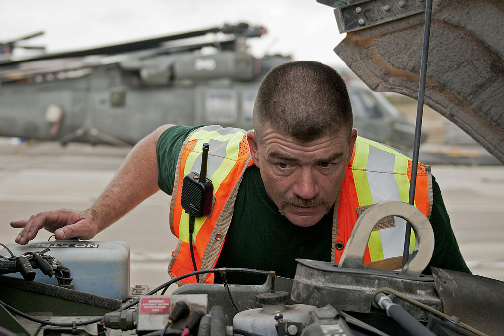 guy_inspecting_truck.jpg